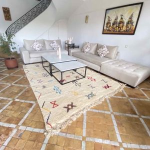 cream rug in living-room