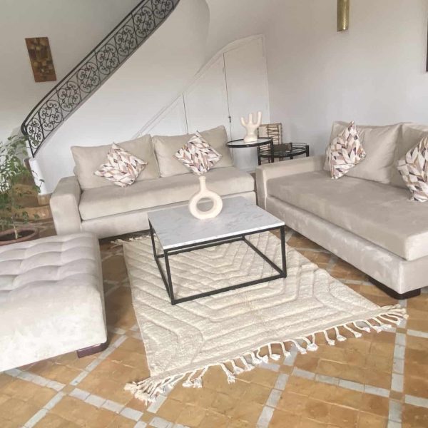 medium white rug in living-room