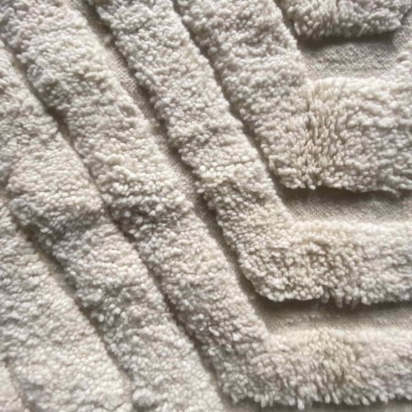 medium white rug in detail