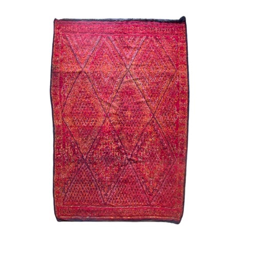 red berber rug in white background